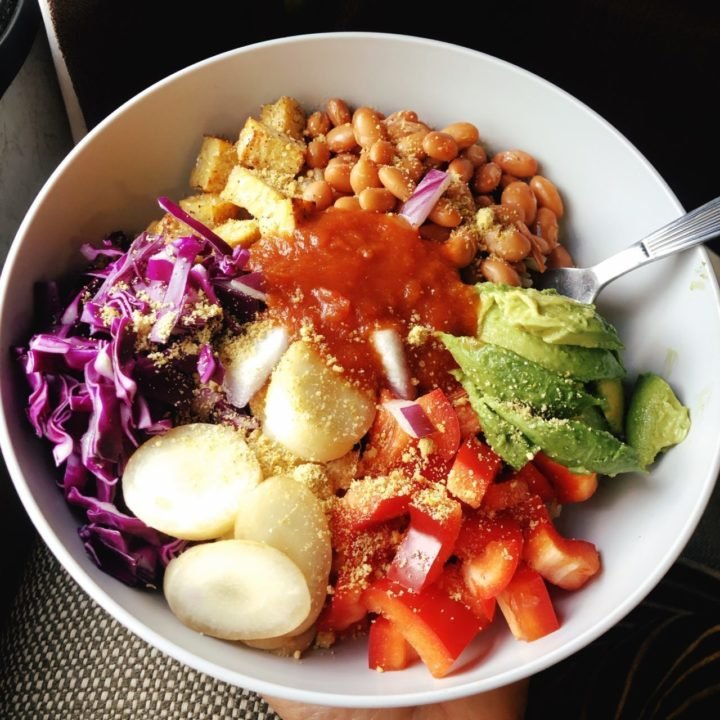 easy bean burrito bowl in a grey plastic bowl.