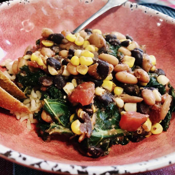 easy beans in greens in a bowl.