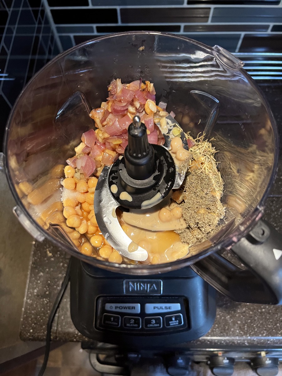 all ingredients for thanksgivng hummus in a food processor.