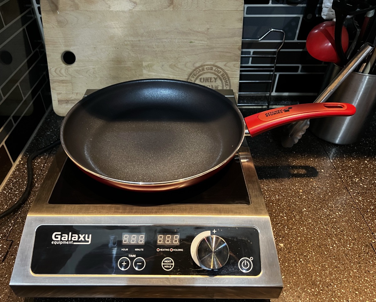 greenpan kitchen stories frying pan on an induction plate.