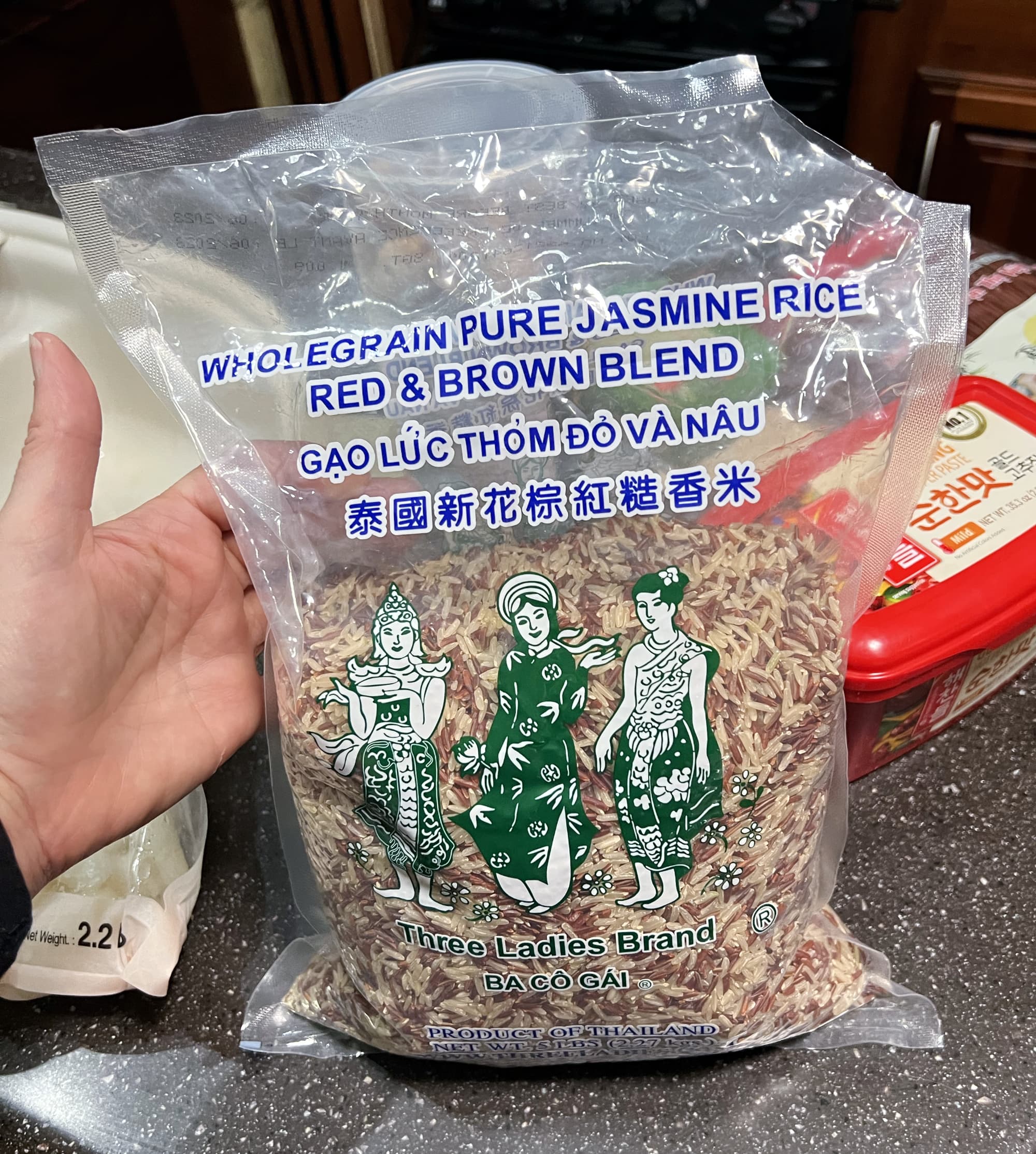 a bag of red and brown jasmine rice blend.