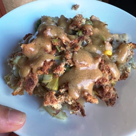simple brown gravy on top of a thanksgiving casserole.